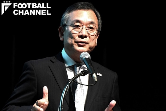 村井満